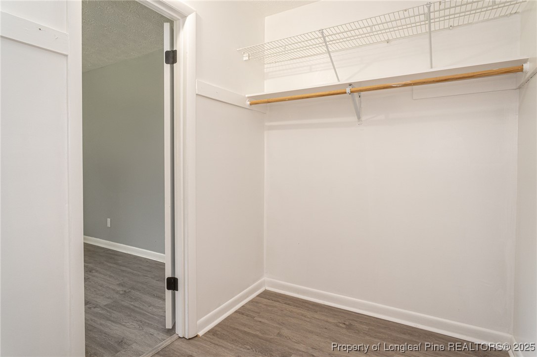 4748 Old Spears Road Fayetteville, NC 28304 - Photo 30 of 37 a view of an empty walk in closet