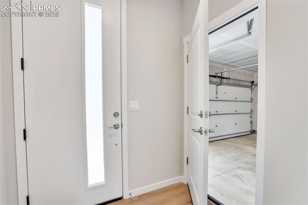 241 Front Street, Unit 101 Monument, CO 80132 - Photo 20 of 29 an empty room with mirror in it