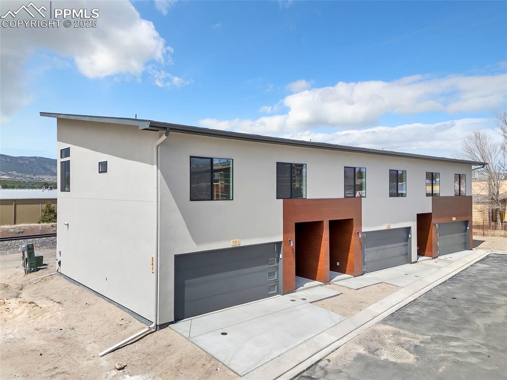 241 Front Street, Unit 101 Monument, CO 80132 - Photo 26 of 29 a view of a house with wooden floor