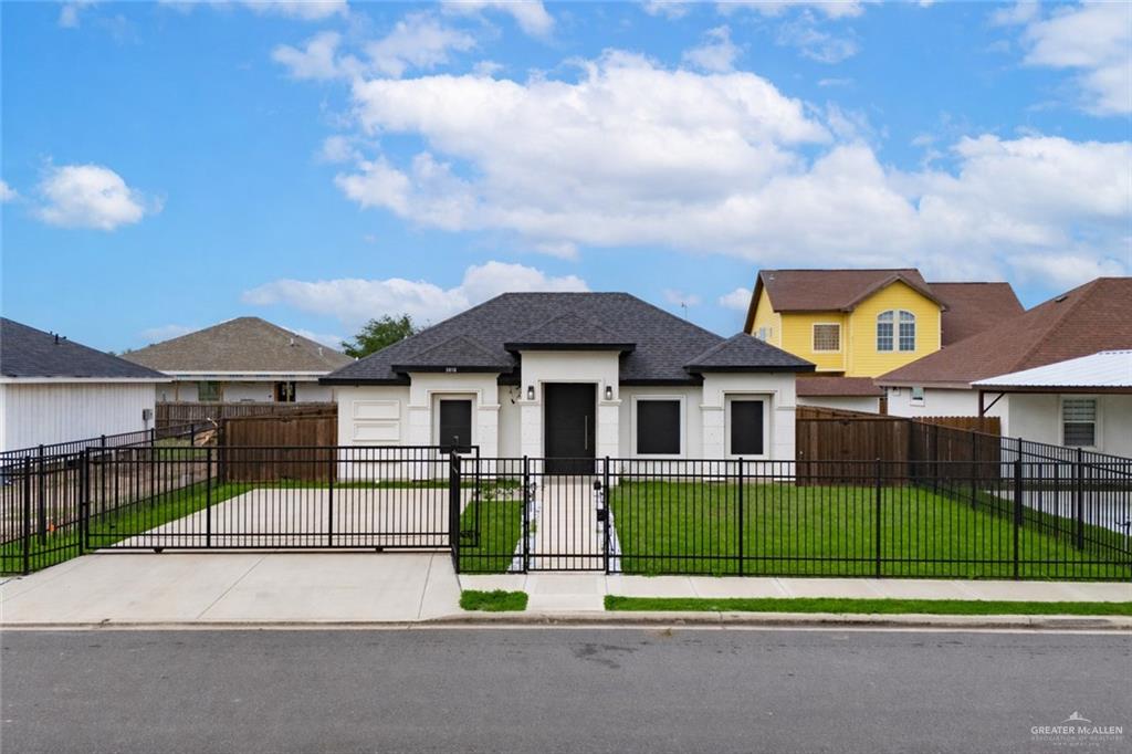 3018 Arrow Lane Weslaco, TX 78596 - Photo 1 of 22 a view of front of house with a wrought fence