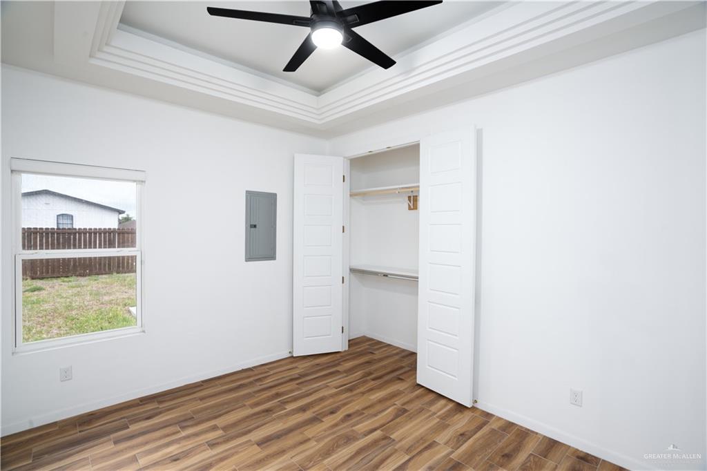 3018 Arrow Lane Weslaco, TX 78596 - Photo 17 of 22 a view of empty room with wooden floor