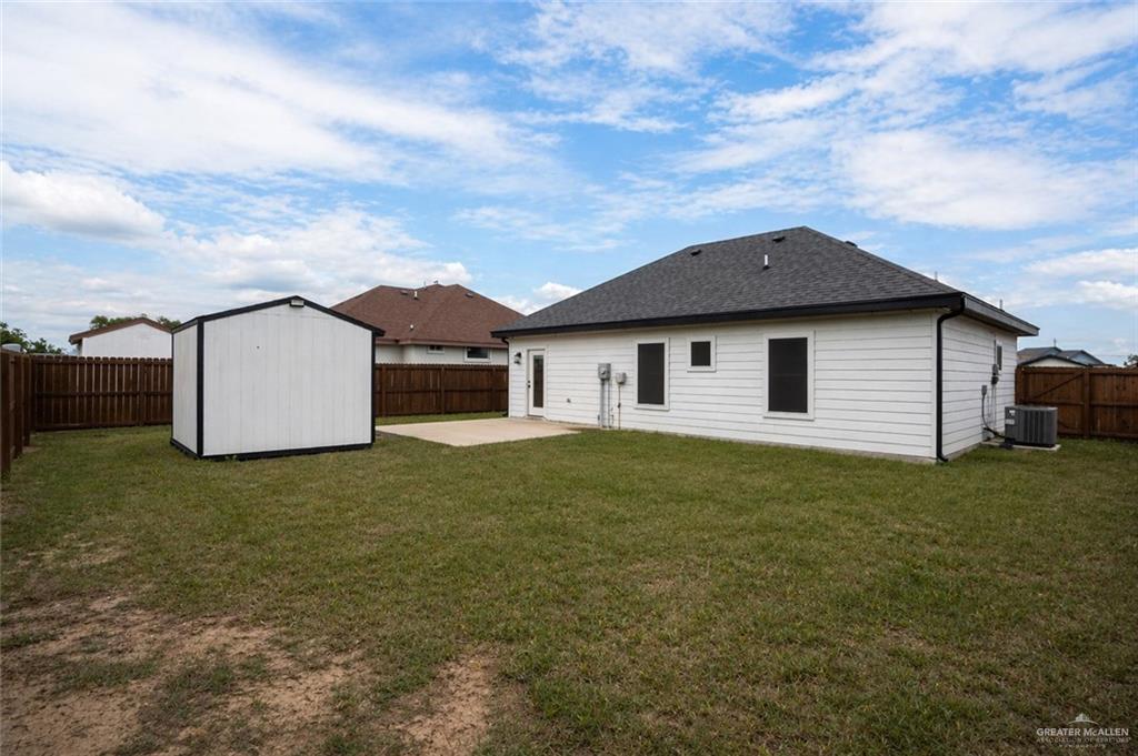 3018 Arrow Lane Weslaco, TX 78596 - Photo 19 of 22 front view of a house with a yard
