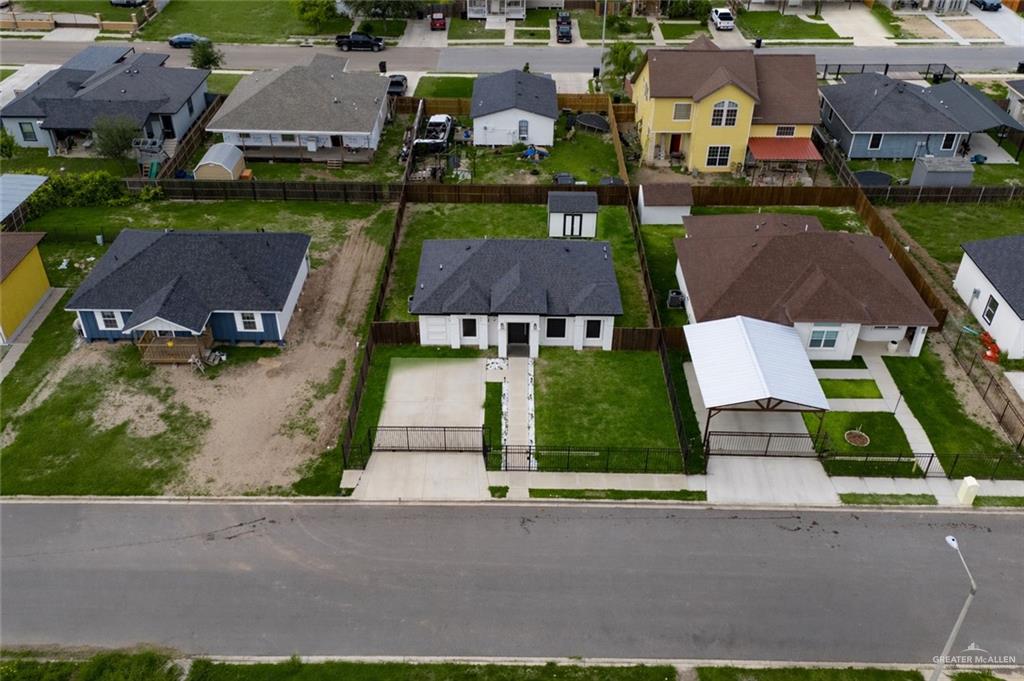 3018 Arrow Lane Weslaco, TX 78596 - Photo 21 of 22 an aerial view of multiple houses with yard