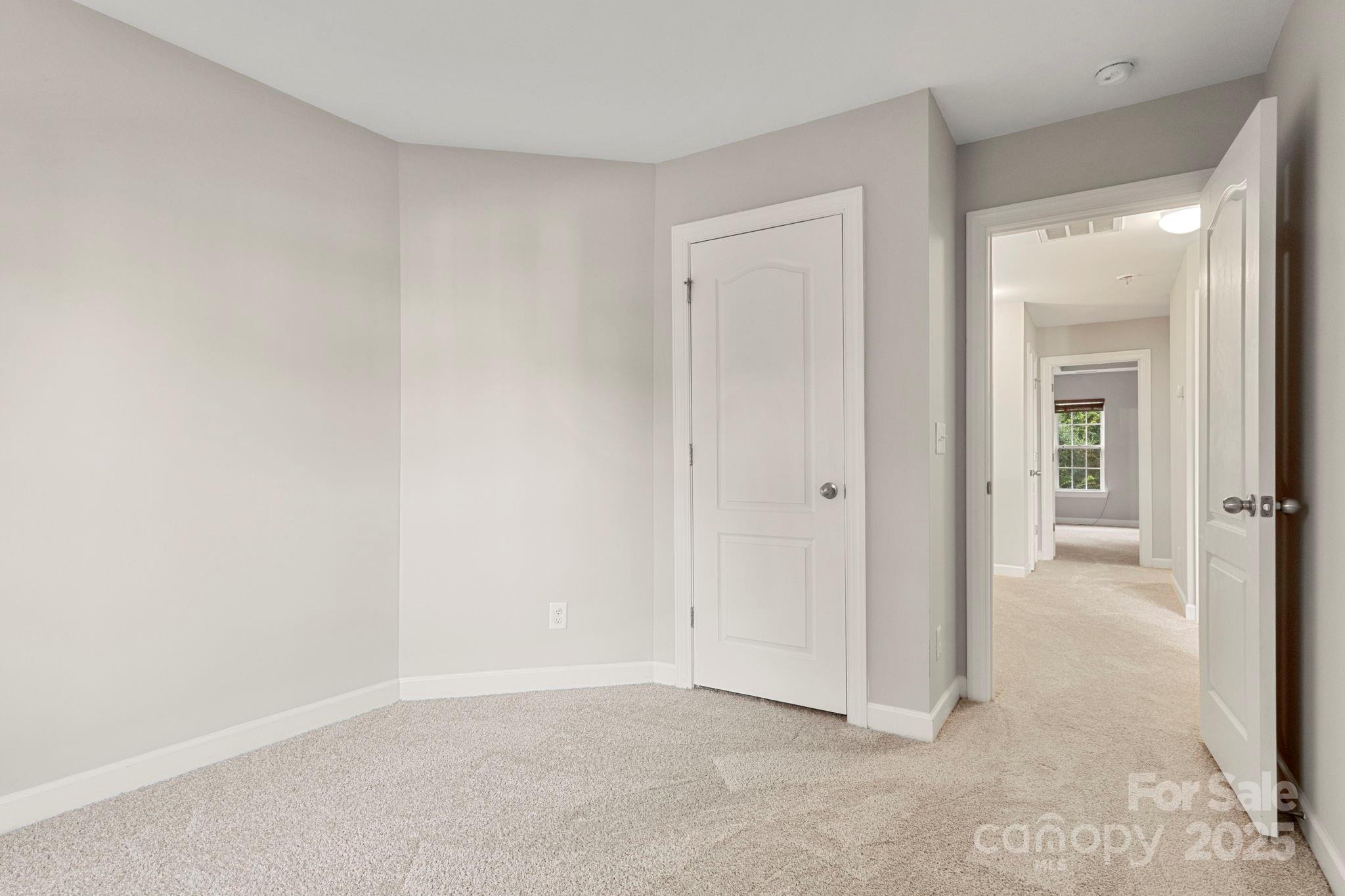 6927 Maricopa Road Charlotte, NC 28277 - Photo 18 of 32 a view of an empty room and closet area