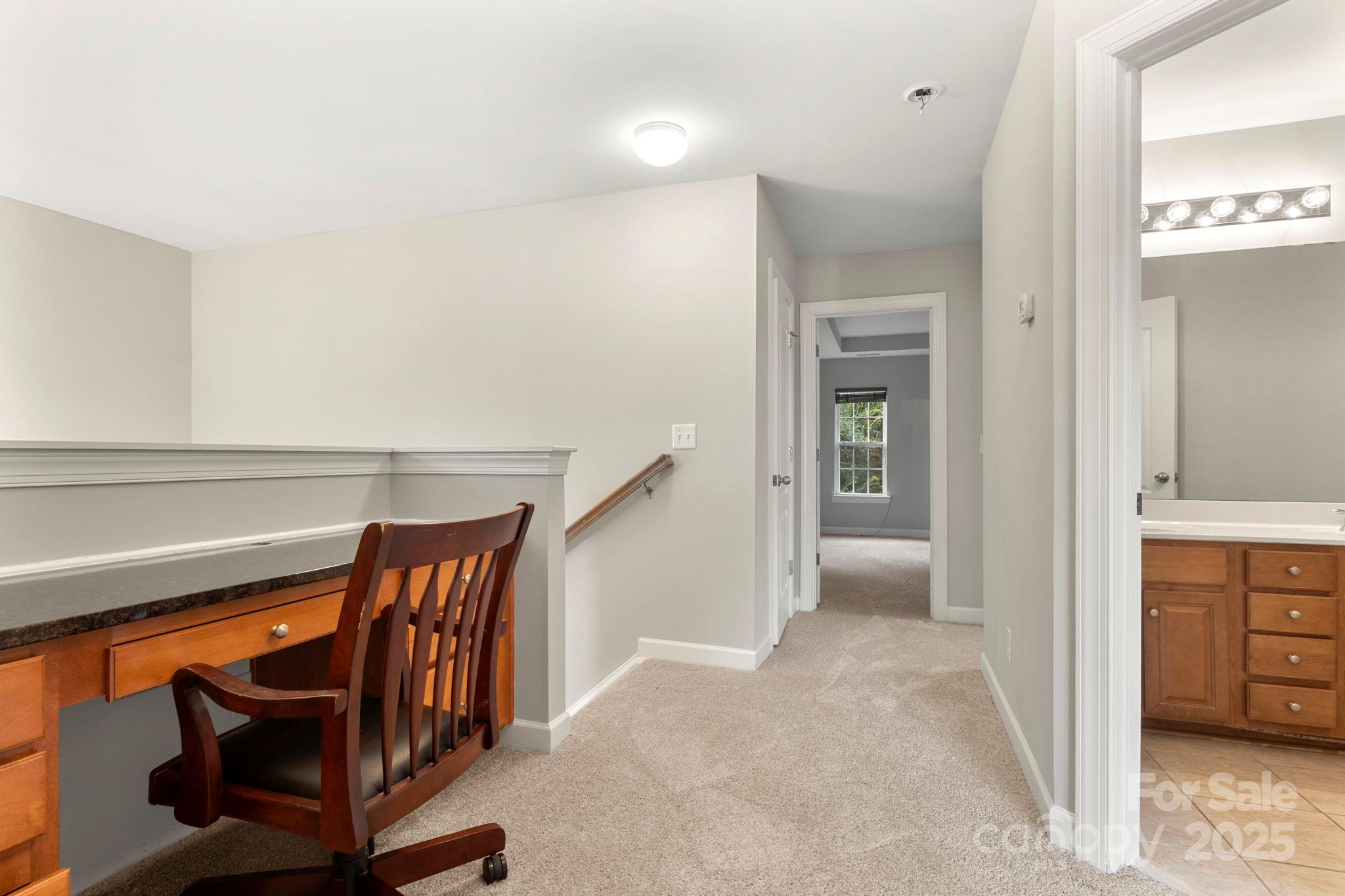 6927 Maricopa Road Charlotte, NC 28277 - Photo 21 of 32 a view of a hallway with seating space