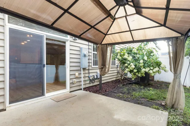 a house view with a backyard space