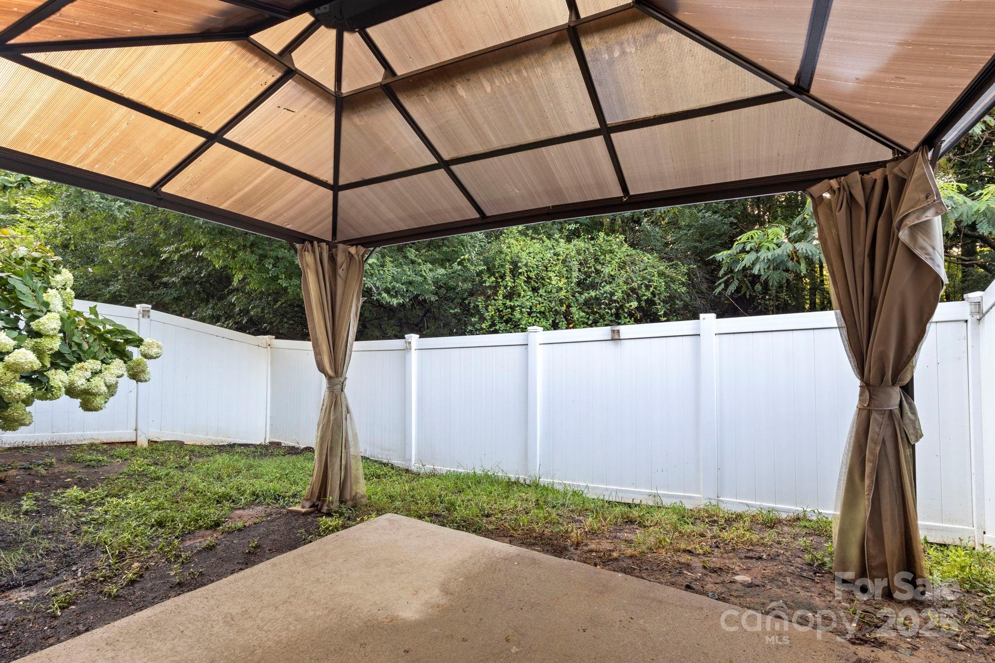 6927 Maricopa Road Charlotte, NC 28277 - Photo 32 of 32 a house view with a backyard space