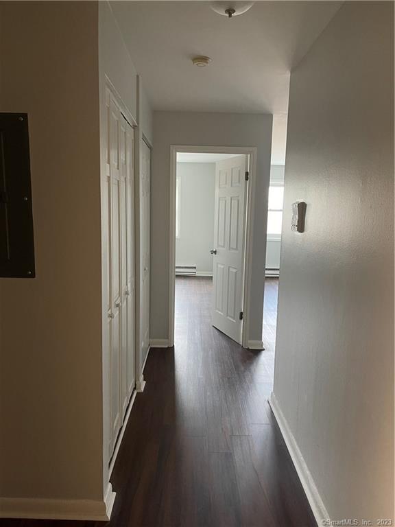45 Monroe Street, Unit C6 Bridgeport, CT 06605 - Photo 3 of 11 a view of a hallway with wooden floor