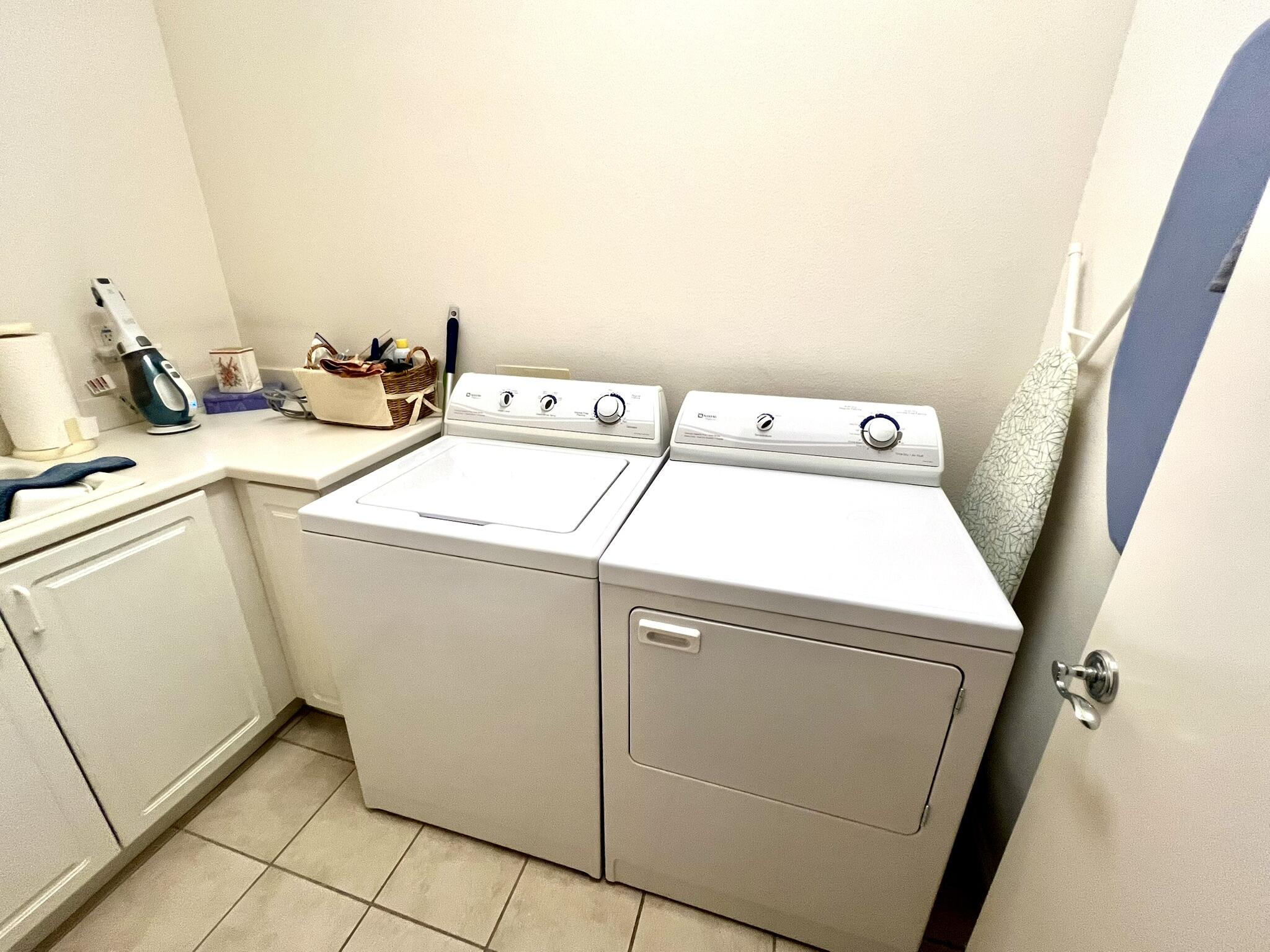 18 Vía Bella Rancho Mirage, CA 92270 - Photo 13 of 15 a utility room with dryer and washer