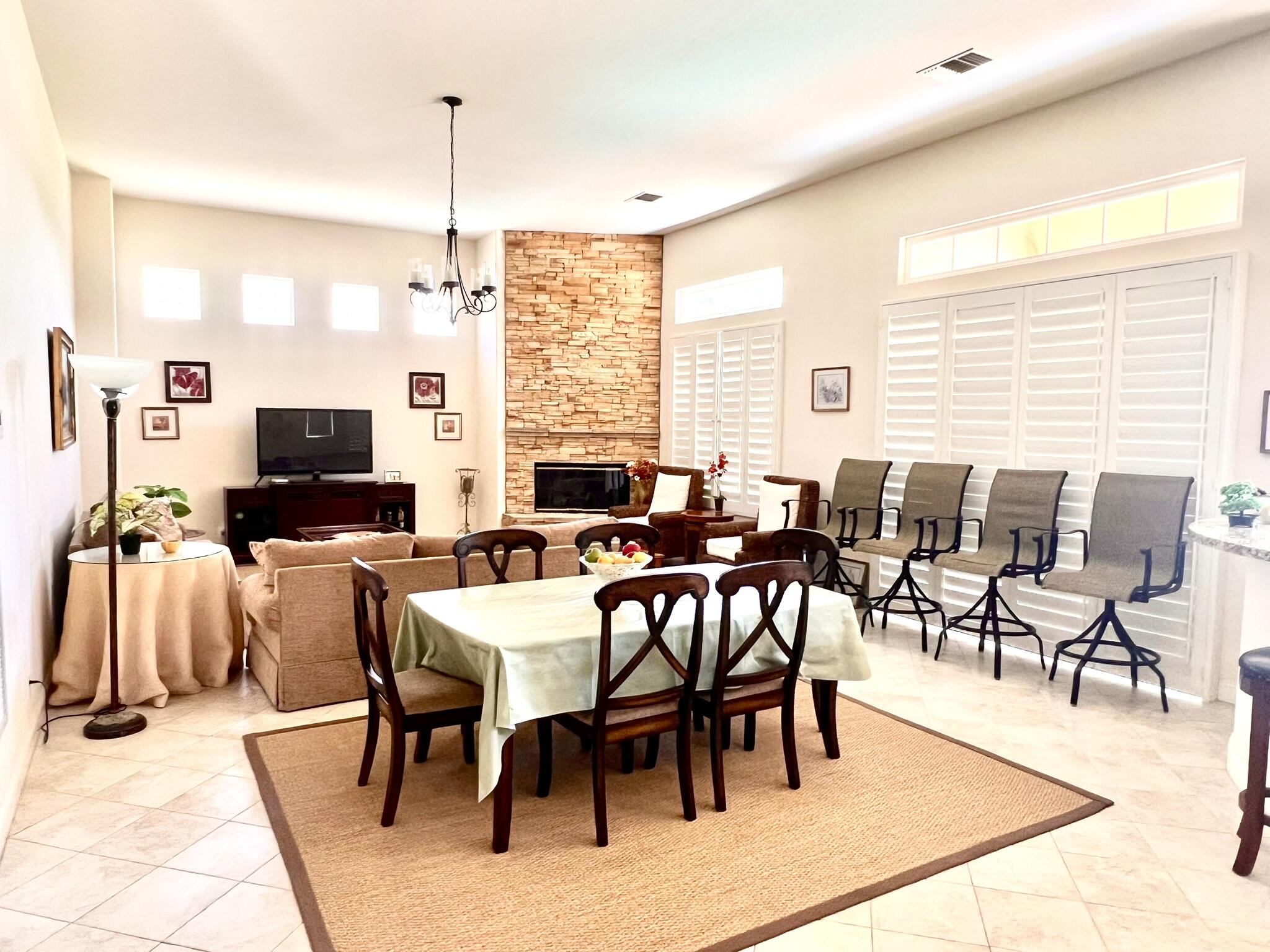 18 Vía Bella Rancho Mirage, CA 92270 - Photo 5 of 15 a view of a dining room with furniture