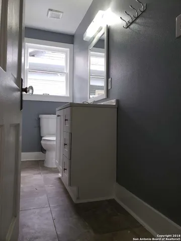 a bathroom with a toilet