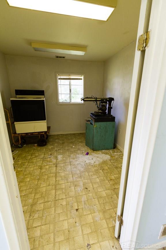 4920 County Line Road New Haven, MI 48048 - Photo 23 of 26 room in back of garage