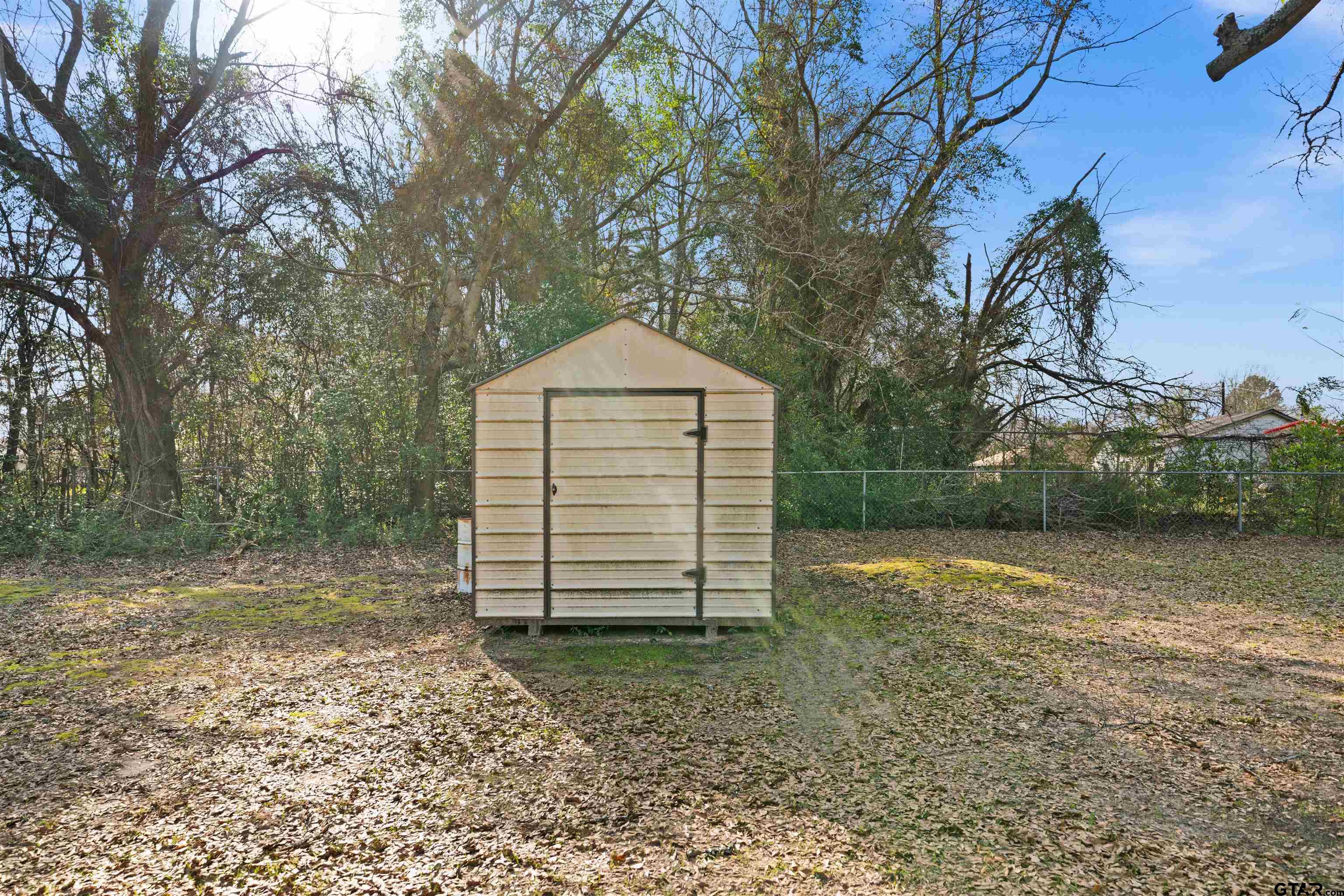 803 Sims Avenue Jacksonville, TX 75766 - Photo 23 of 23 a front view of a house with a yard