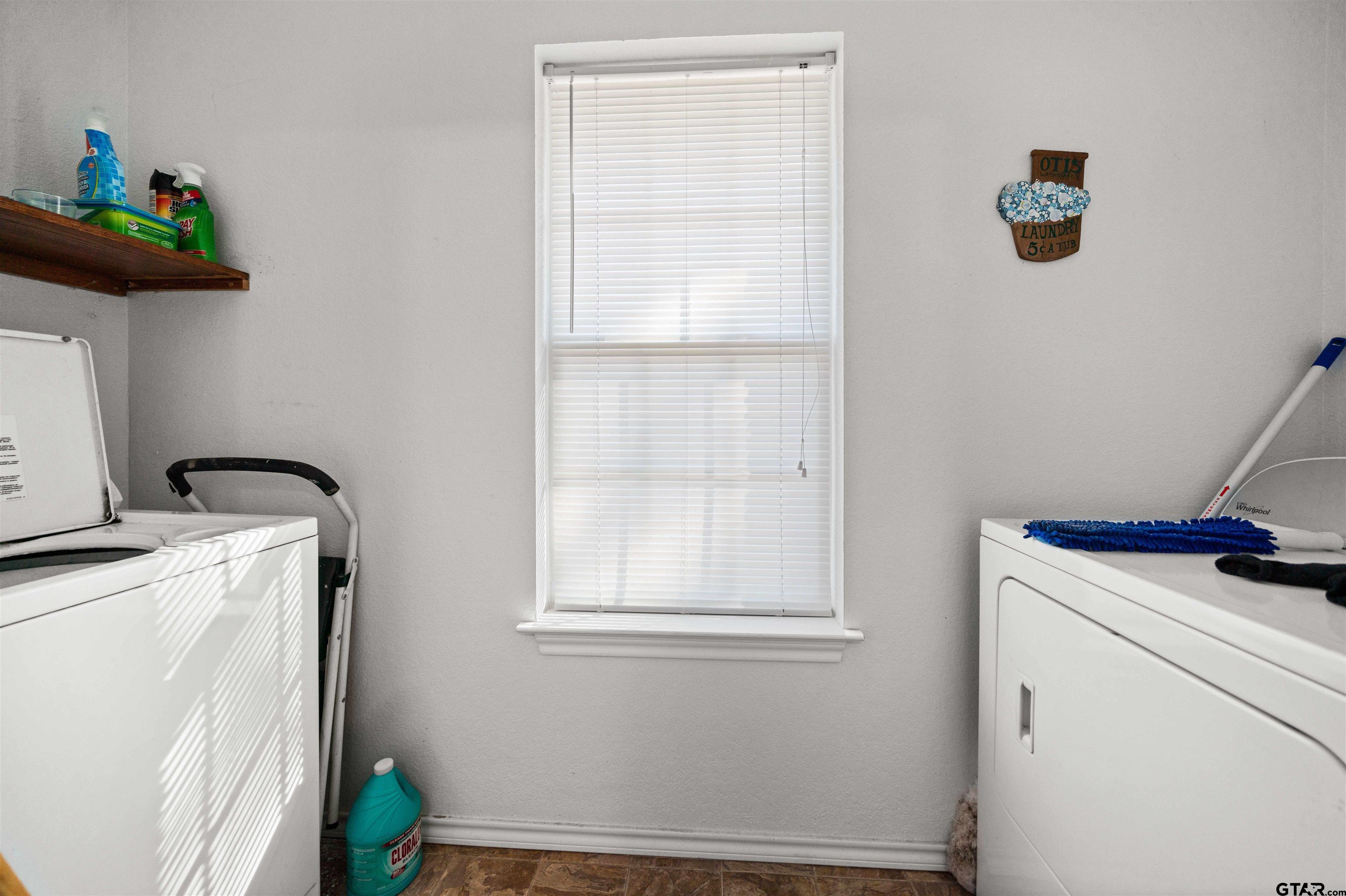 803 Sims Avenue Jacksonville, TX 75766 - Photo 10 of 23 a room with storage and utility