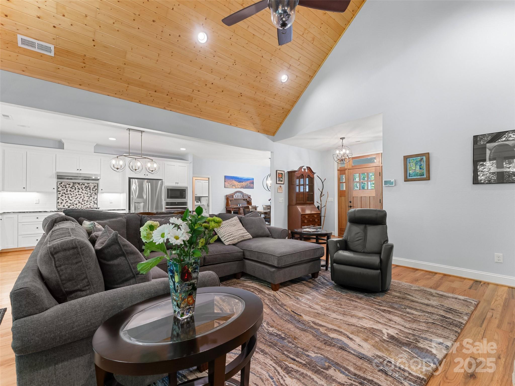 249 Tsisqua Circle Brevard, NC 28712 - Photo 14 of 39 a living room with furniture kitchen view and a table