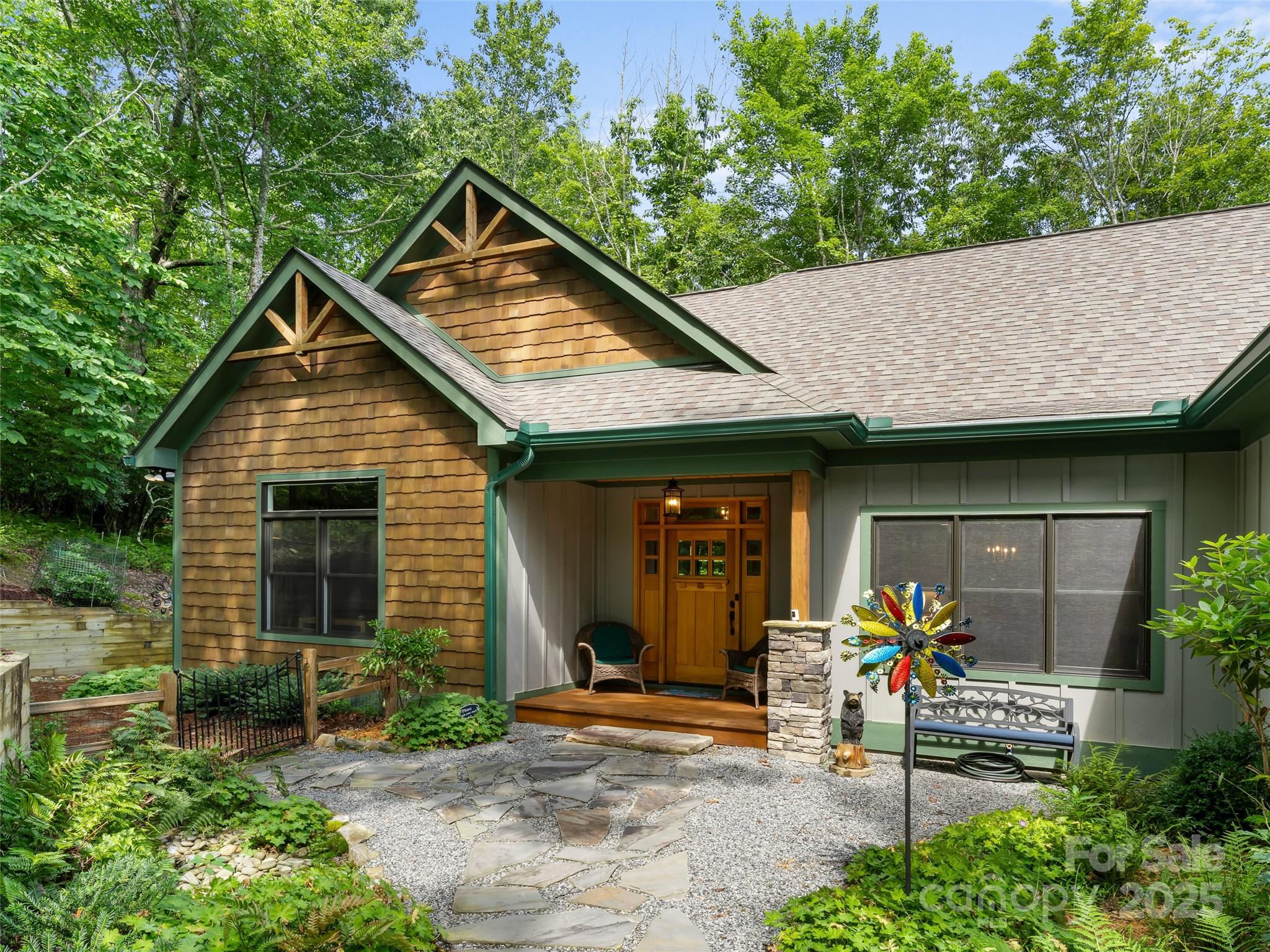 249 Tsisqua Circle Brevard, NC 28712 - Photo 2 of 39 a front view of a house with a yard