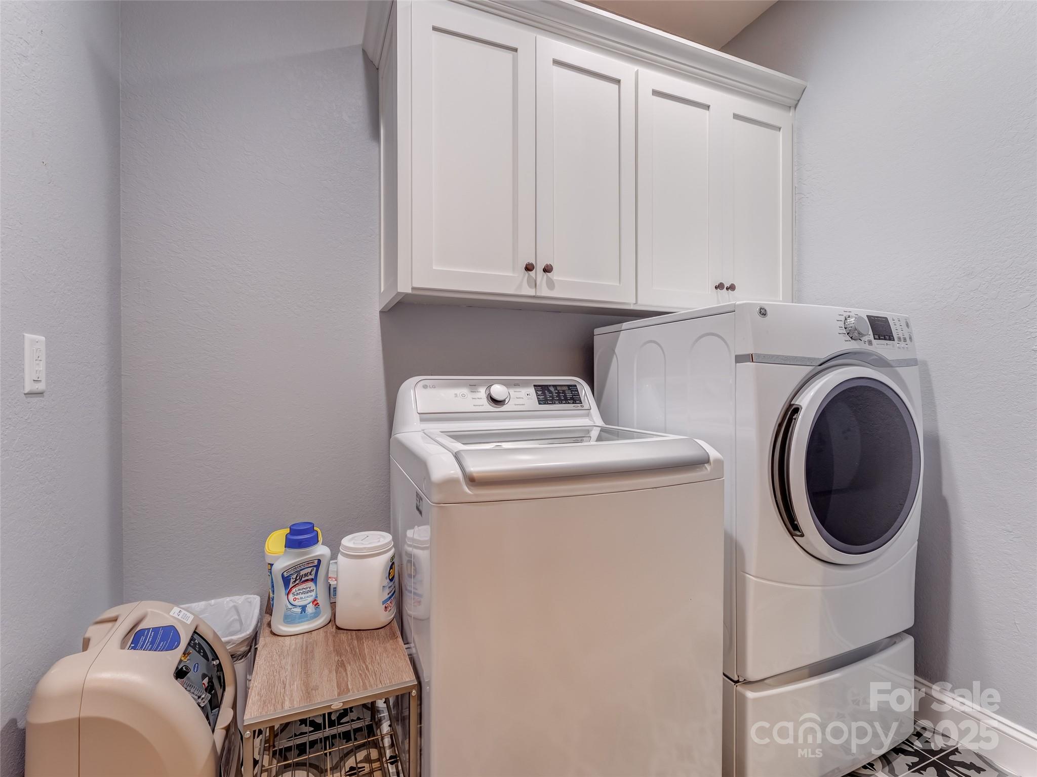249 Tsisqua Circle Brevard, NC 28712 - Photo 23 of 39 a utility room with dryer and washer