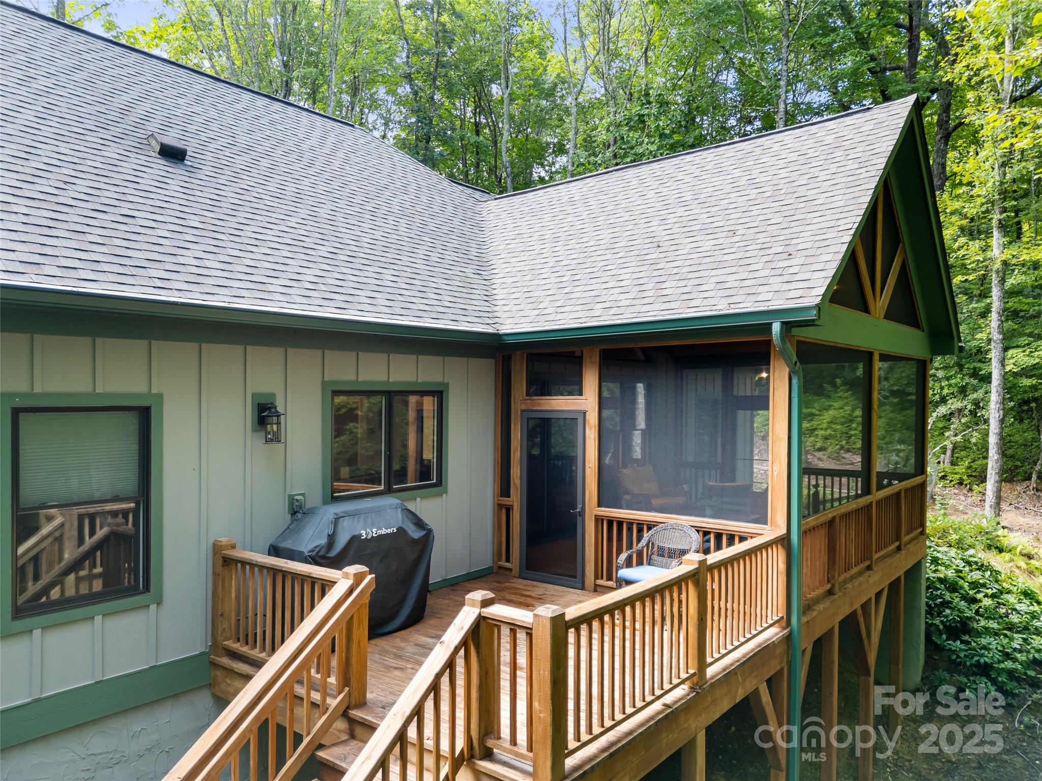 249 Tsisqua Circle Brevard, NC 28712 - Photo 6 of 39 a view of house with wooden deck and furniture