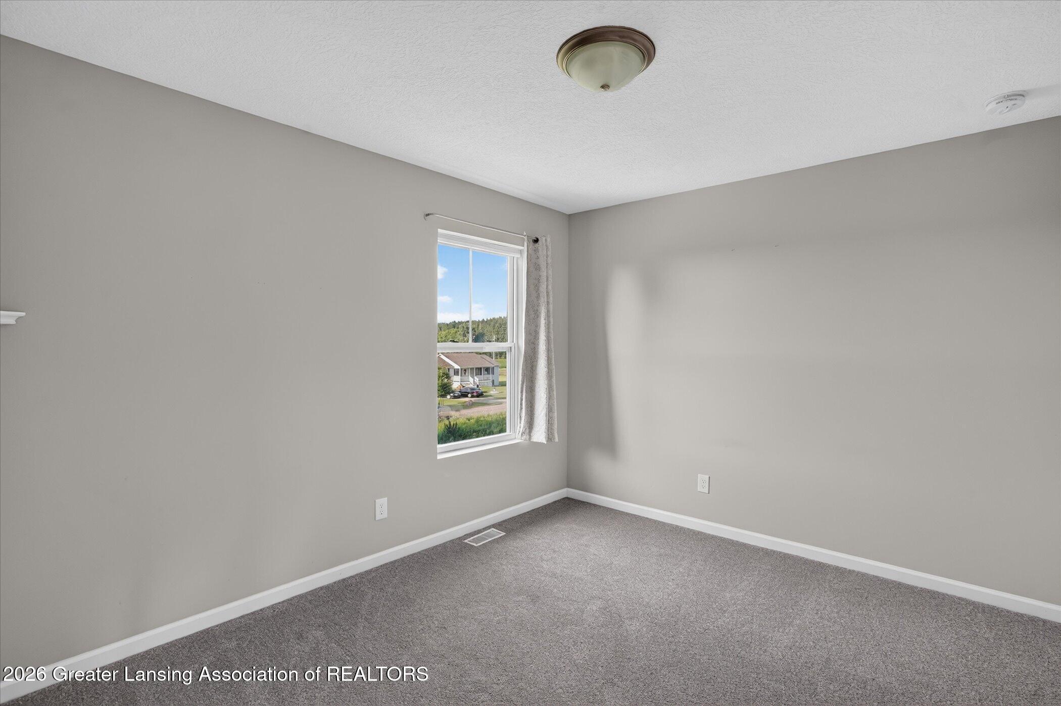 2775 West Winegar Road Morrice, MI 48857 - Photo 31 of 52 31-2775-W-Winegar-Rd-Morrice-WindowStill
