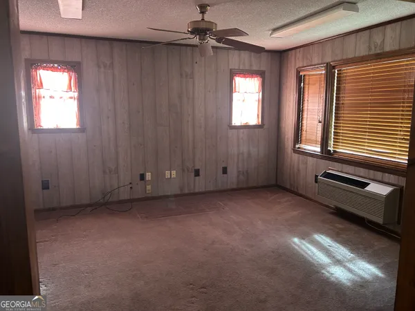 an empty room with windows