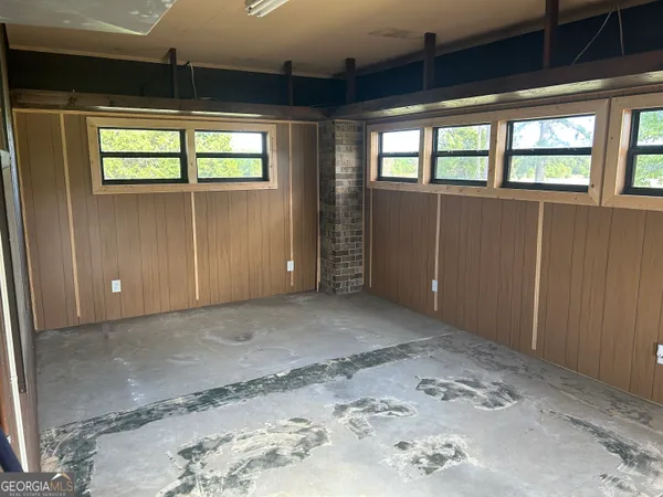 an empty room with windows