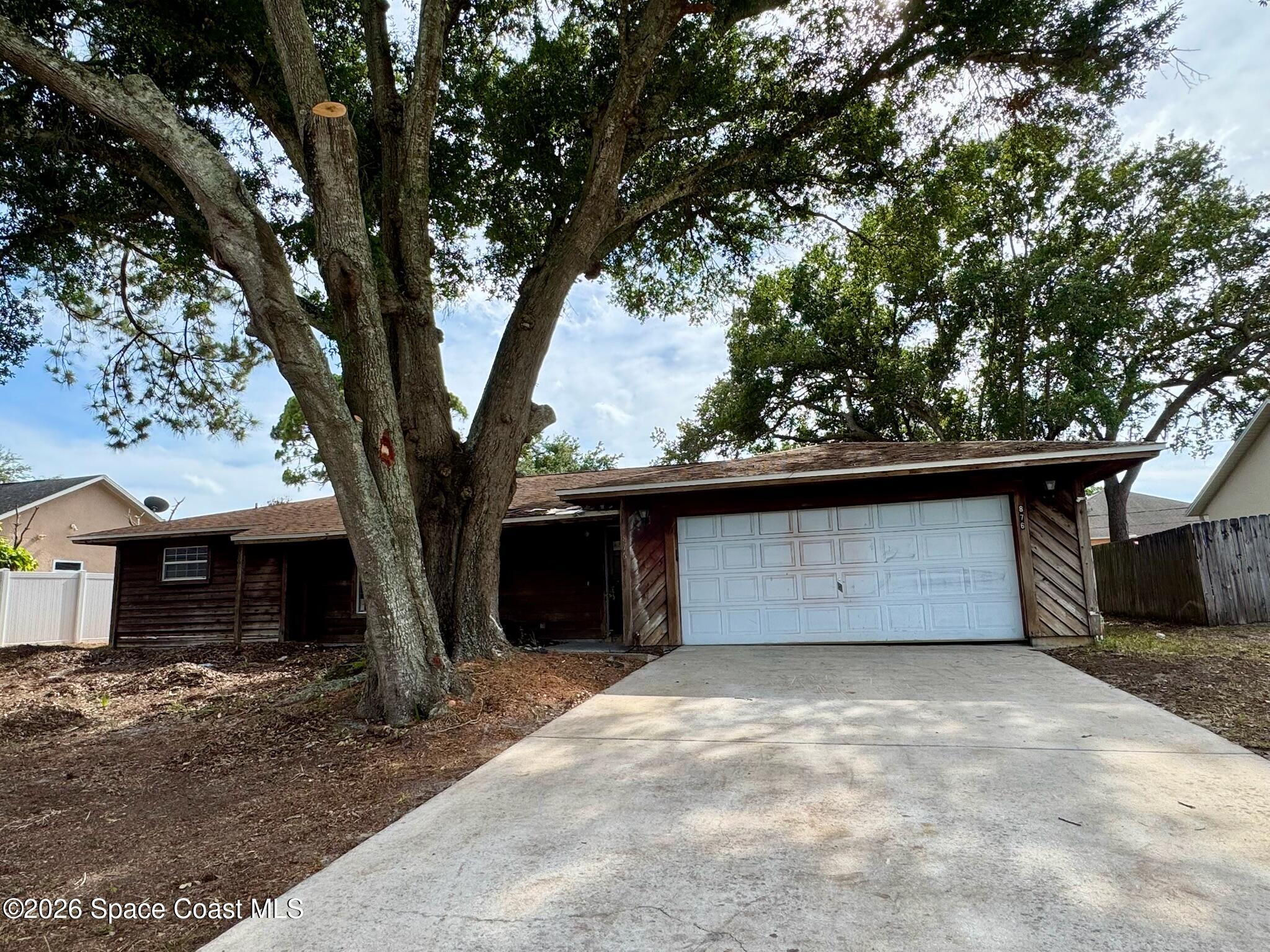 876 Remsen Avenue Northwest Palm Bay, FL 32907 - Photo 1 of 17 IMG_7352