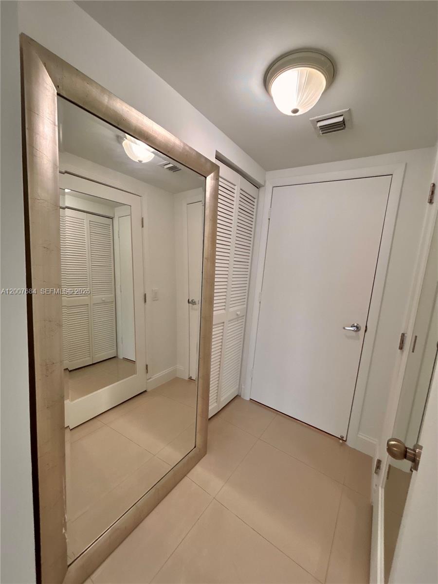 41 Southeast 5th Street, Unit 703 Miami, FL 33131 - Photo 16 of 18 a view of empty room