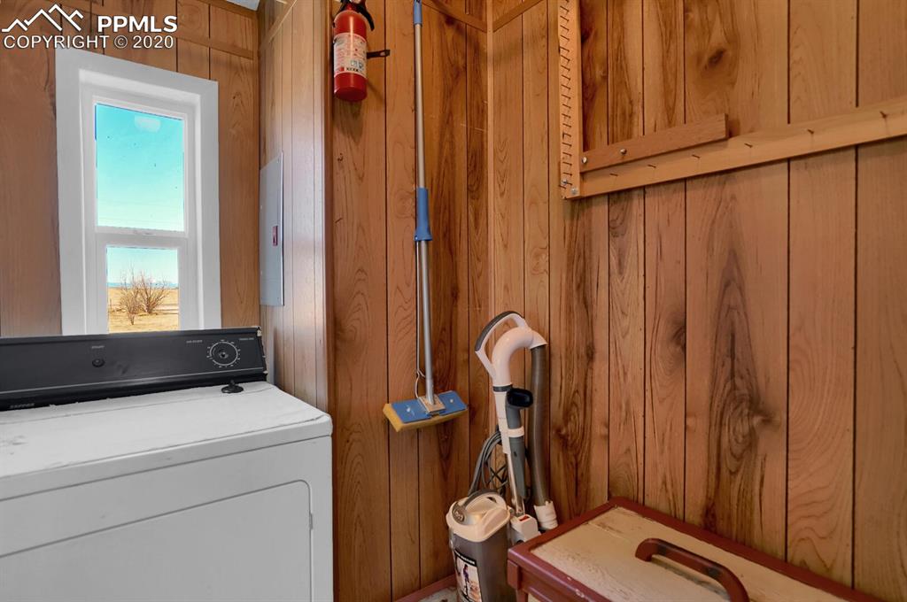 4685 Yoder Road Yoder, CO 80864 - Photo 18 of 32 Laundry space also provides additional storage area.