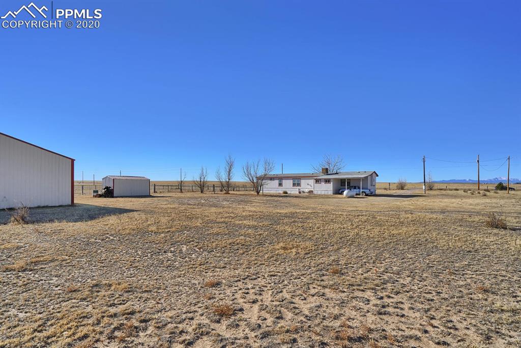 4685 Yoder Road Yoder, CO 80864 - Photo 29 of 32 Large shed provides additional storage.