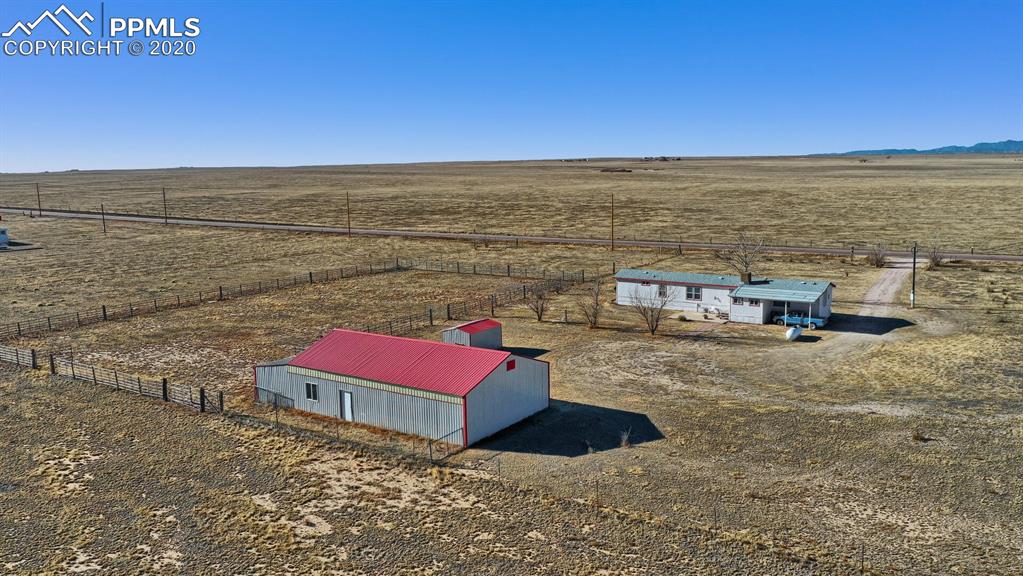 4685 Yoder Road Yoder, CO 80864 - Photo 4 of 32 60 panel outdoor arena included.