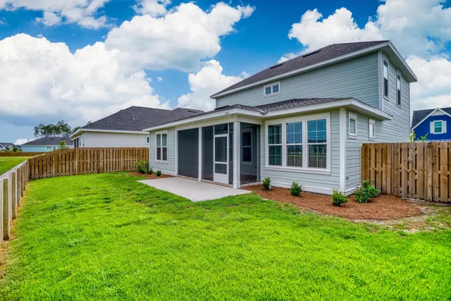 a view of a house with a garden