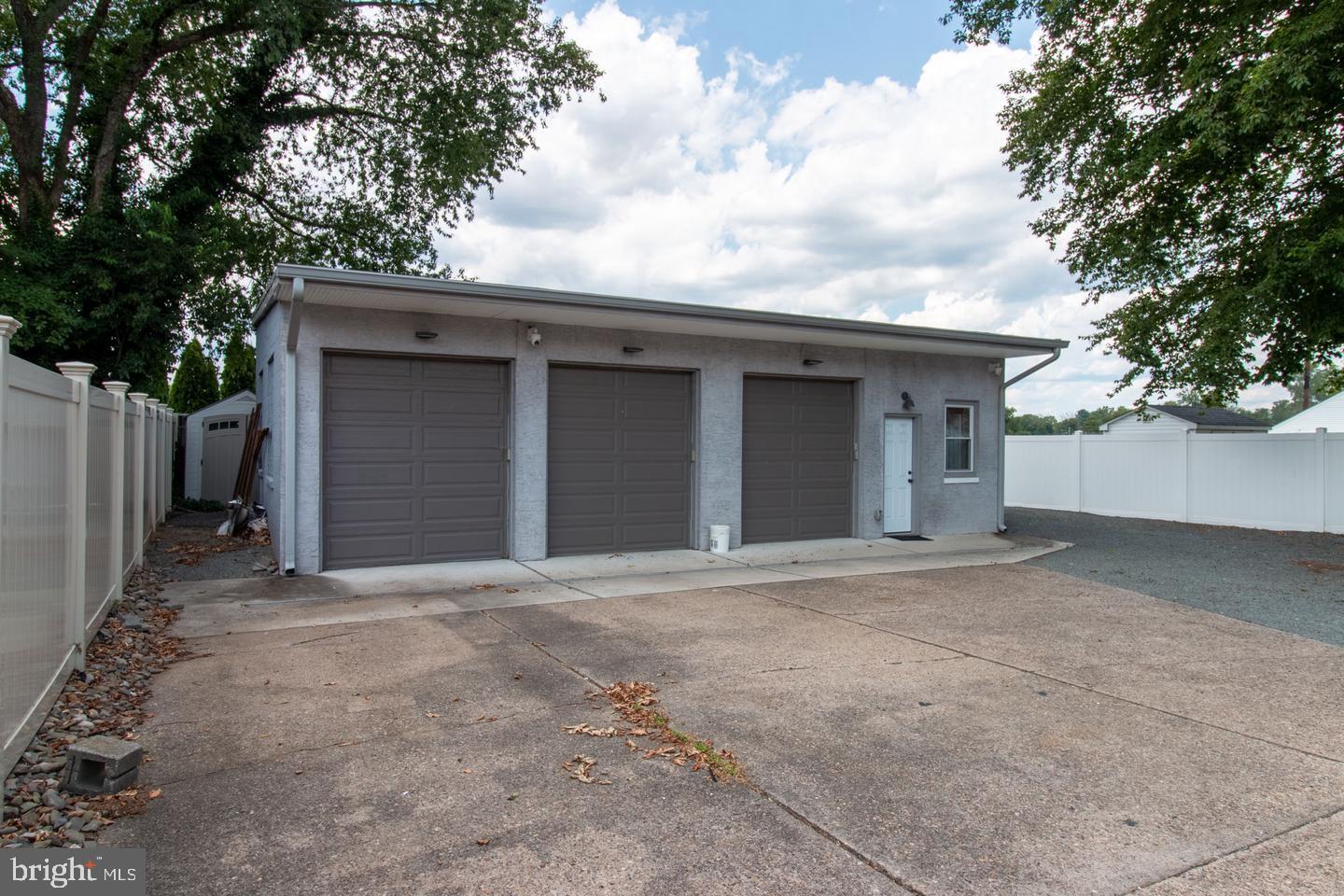 a front view of a house with garage