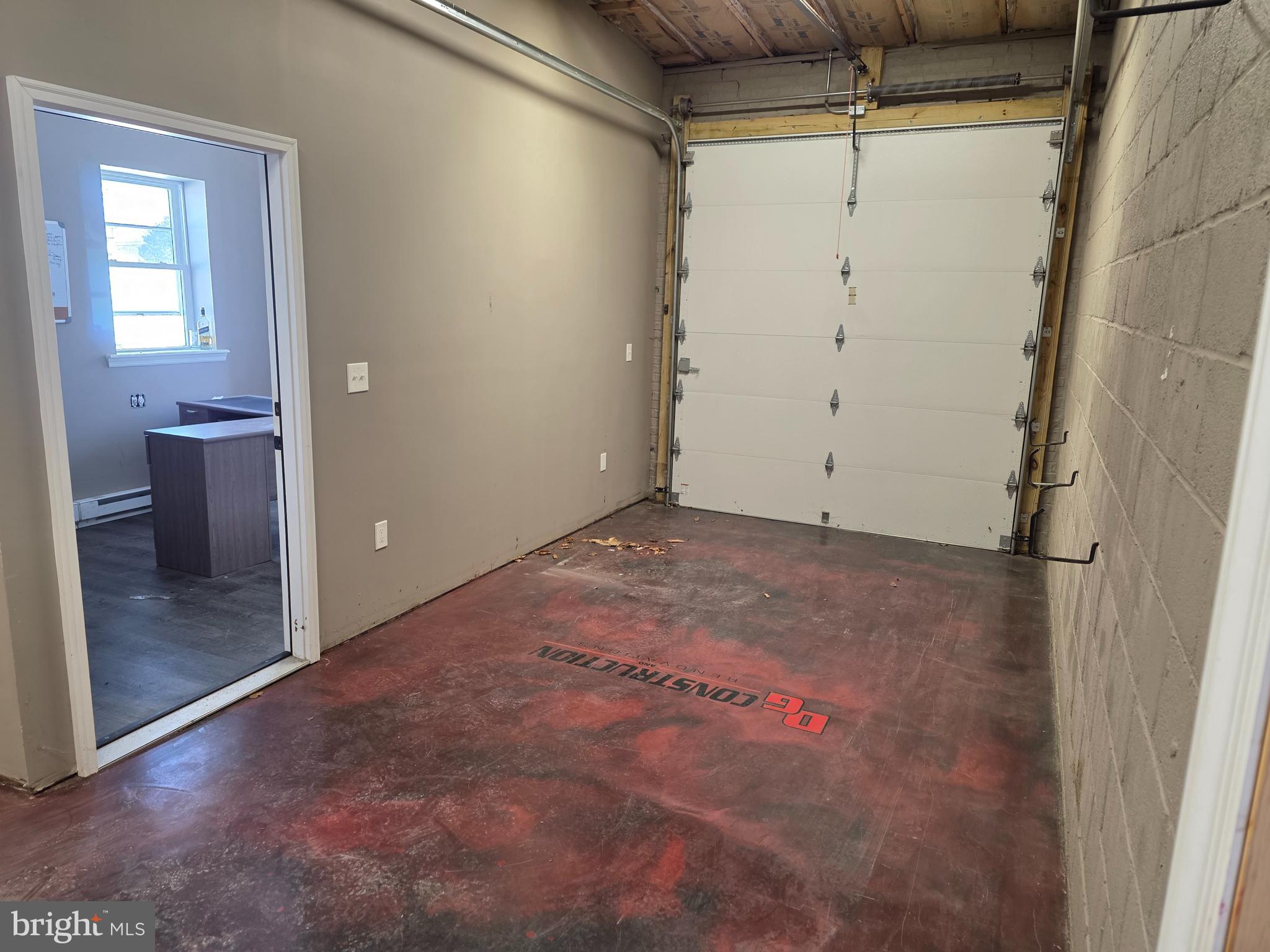 115 Samdin Boulevard Hamilton, NJ 08610 - Photo 5 of 9 an empty room with an entryway