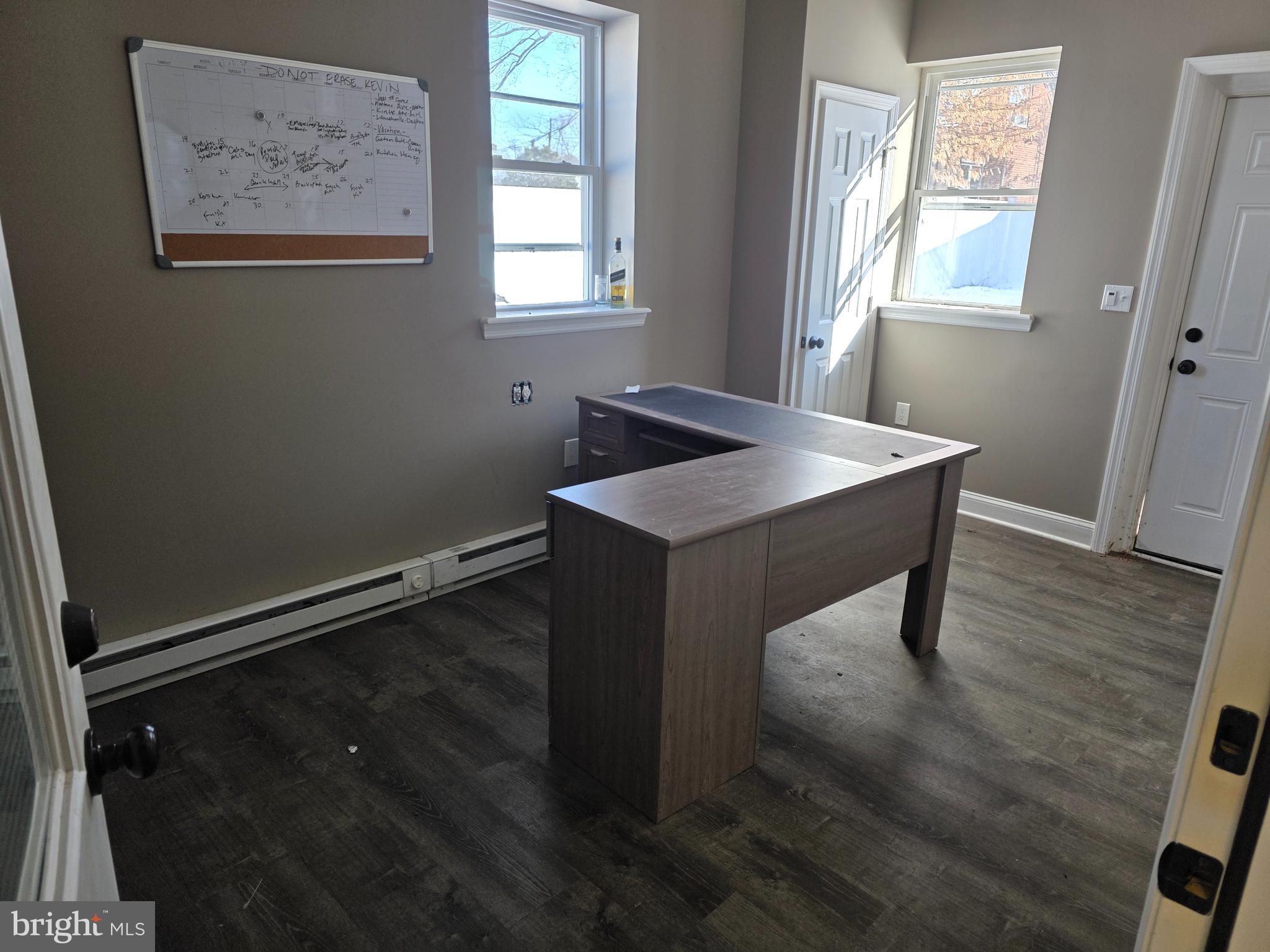 115 Samdin Boulevard Hamilton, NJ 08610 - Photo 8 of 9 a room with a table and windows