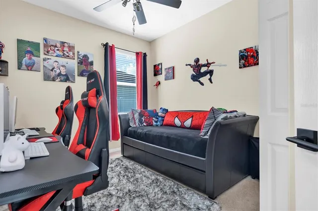 a living room with lots of baby furniture