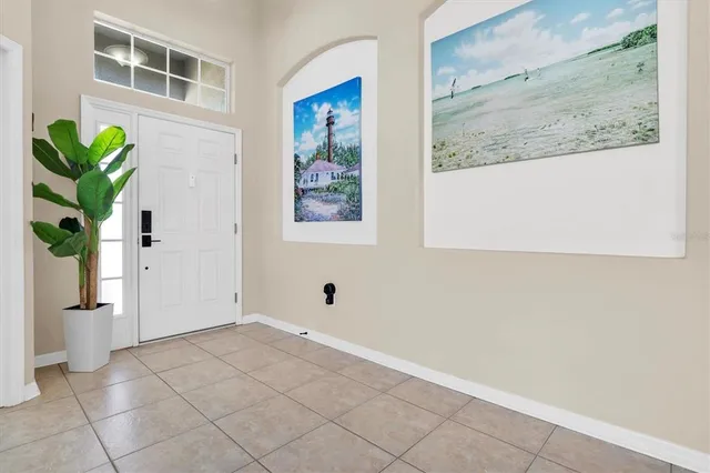 a view of entryway with wooden floor