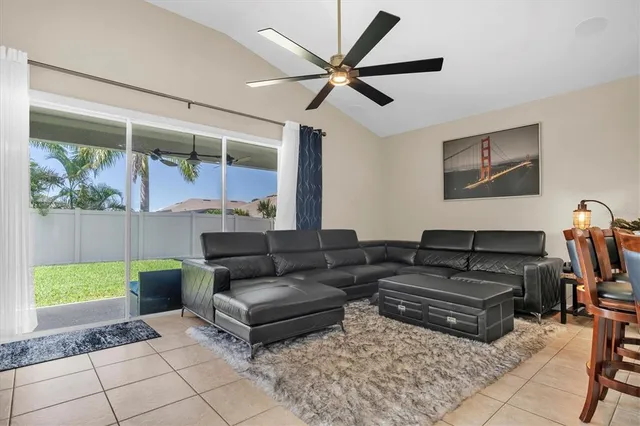 a living room with furniture and a window