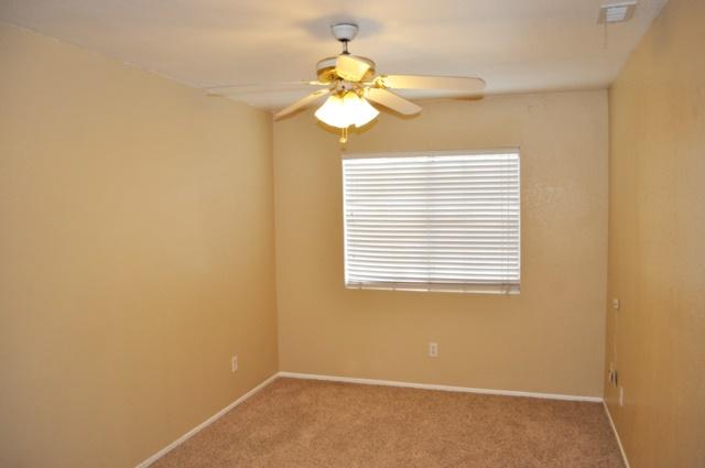 3153 Quarry Road Palmdale, CA 93550 - Photo 17 of 21 a view of a windows and a chandelier fan in a room