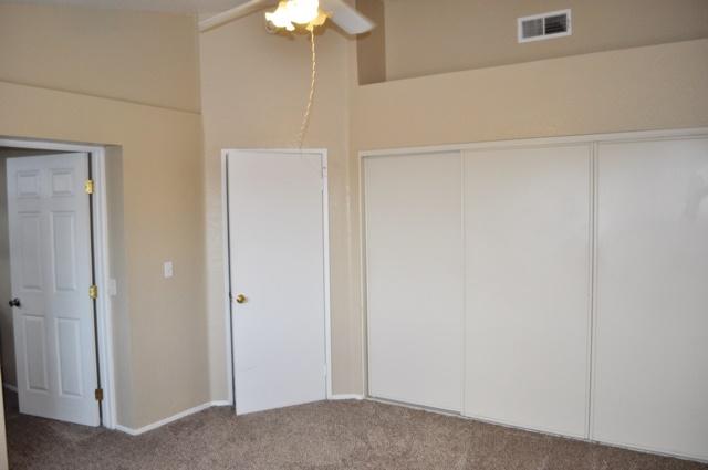 3153 Quarry Road Palmdale, CA 93550 - Photo 10 of 21 a view of a room with a chandelier fan