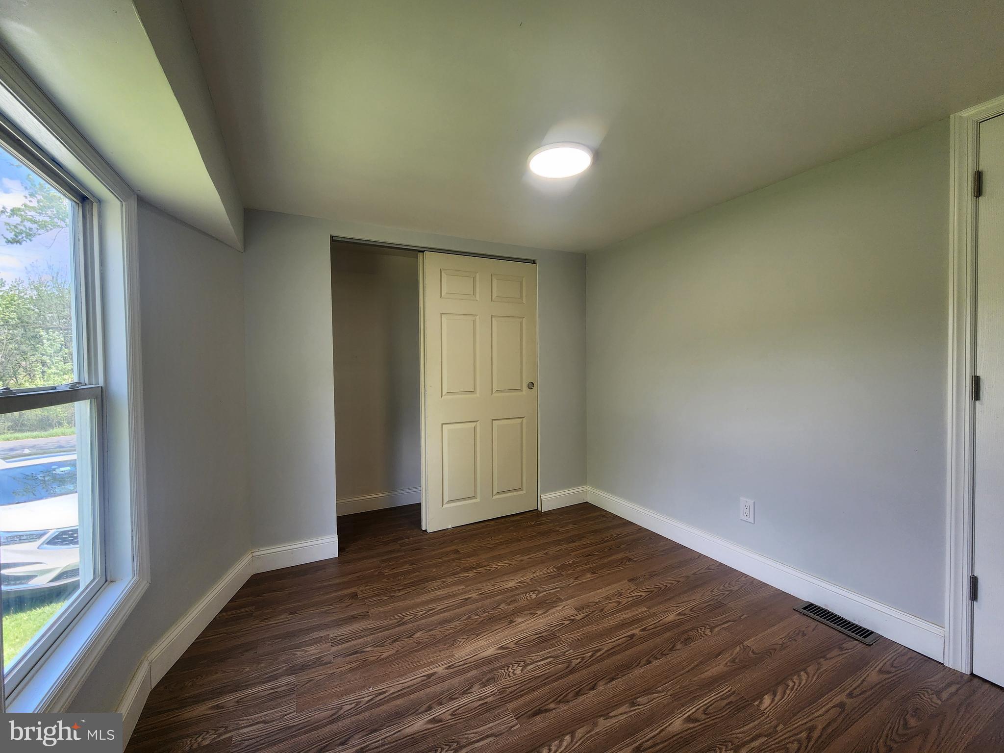 41 Mountain View Terrace Newville, PA 17241 - Photo 25 of 34 an empty room with wooden floor and windows