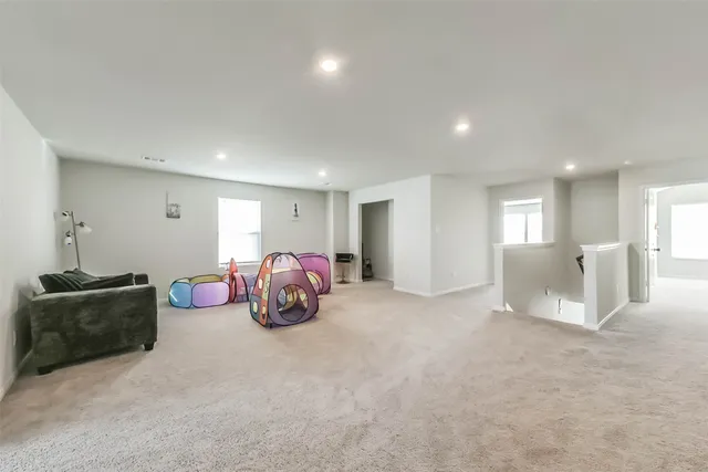 a view of a livingroom with furniture