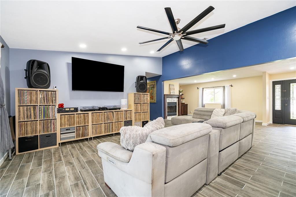 2350 Wekiva Ridge Road Apopka, FL 32712 - Photo 12 of 34 a living room with furniture and a flat screen tv