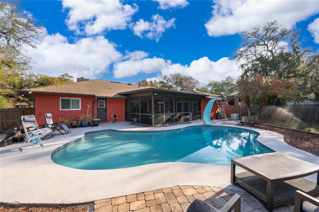 2350 Wekiva Ridge Road Apopka, FL 32712 - Photo 15 of 34 a view of a house with backyard porch and sitting area