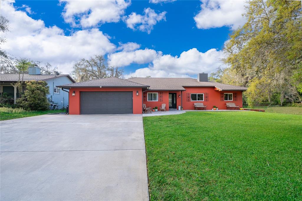 2350 Wekiva Ridge Road Apopka, FL 32712 - Photo 2 of 34 front view of house with a yard