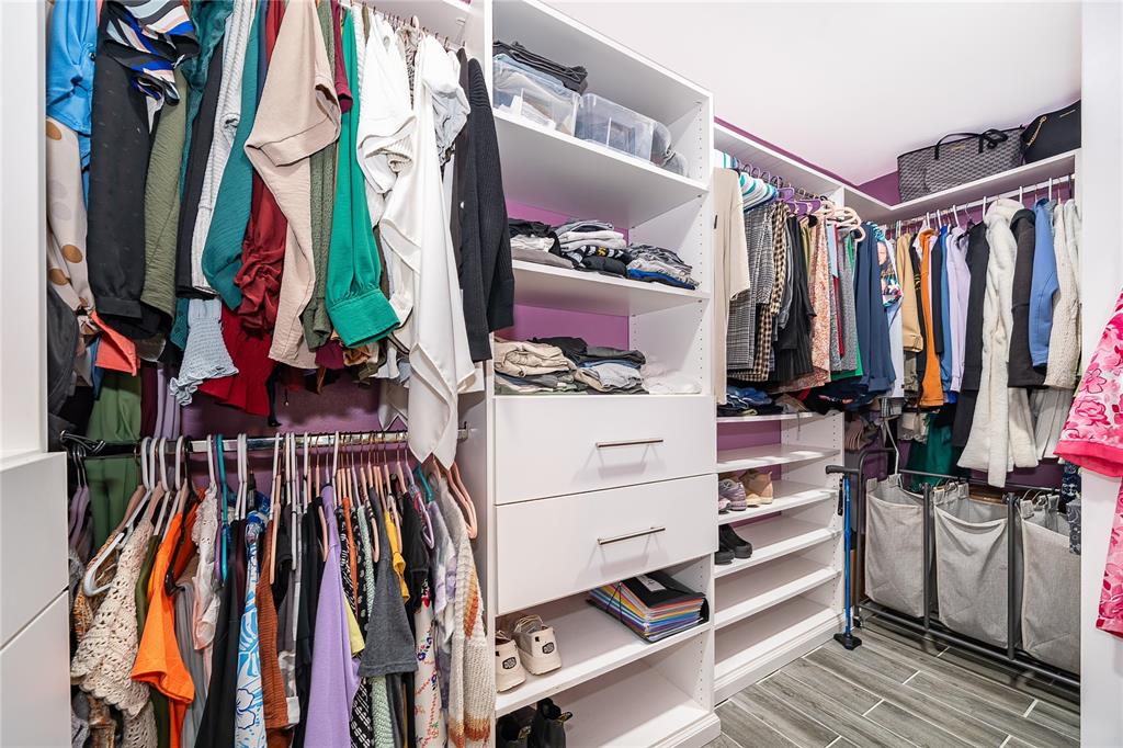 2350 Wekiva Ridge Road Apopka, FL 32712 - Photo 21 of 34 a view of walk in closet with clothes and shoes