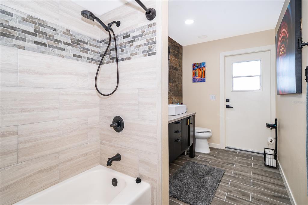 2350 Wekiva Ridge Road Apopka, FL 32712 - Photo 27 of 34 a bathroom with a bathtub and a shower