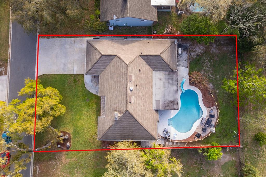2350 Wekiva Ridge Road Apopka, FL 32712 - Photo 32 of 34 an aerial view of a house with swimming pool