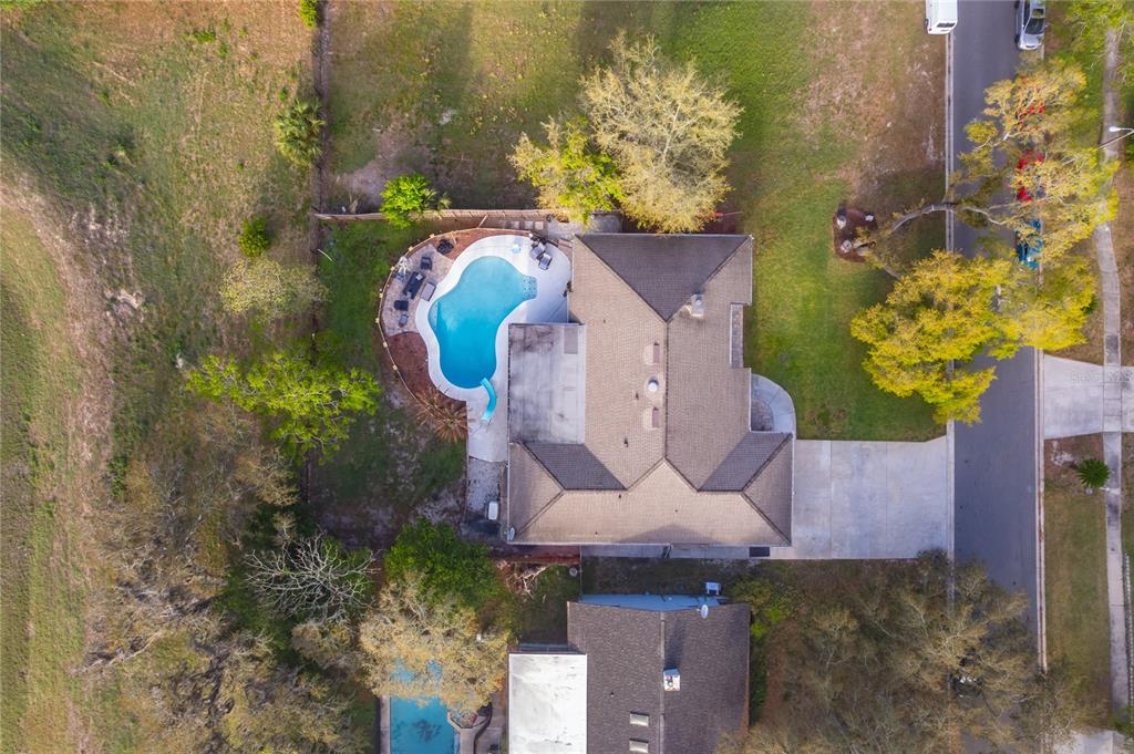2350 Wekiva Ridge Road Apopka, FL 32712 - Photo 34 of 34 an aerial view of a house with a swimming pool
