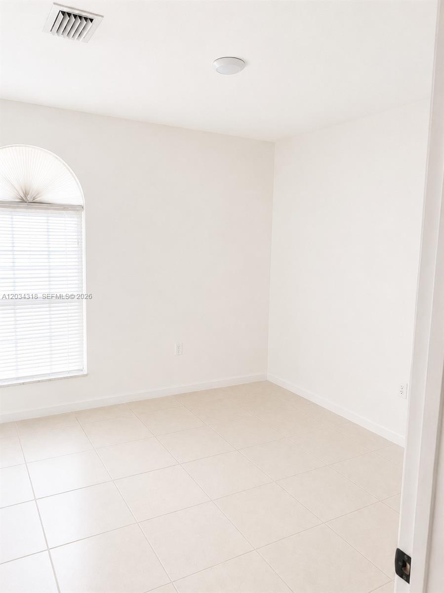 14856 Southwest 179th Street Miami, FL 33187 - Photo 26 of 33 a view of empty room