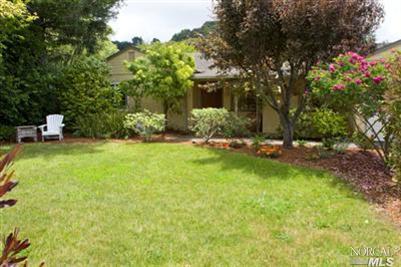 12 Apollo Road Tiburon, CA 94920 - Photo 1 of 1 a view of a chair and table and chairs in the garden